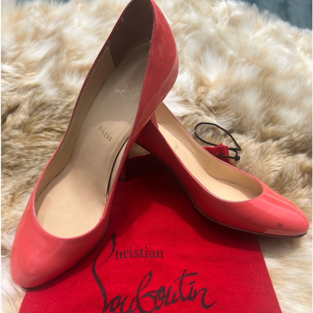 AUTHENTIC Christian Louboutin heels in peachy/pink. Please see all photos.